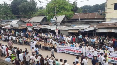 তীব্র যানজট নিরসনে বাইপাস সড়কের দাবিতে কুড়িগ্রামে মানববন্ধন